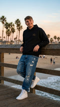 Premium Unisex Sweatshirt Taboga Lifestyle, worn by model
